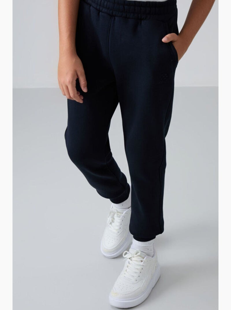 Pantalon jogging enfant tommy Noir - Kiabi