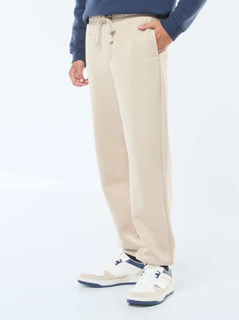 Pantalon jogging uni avec cordons de serrage à la taille Beige - Kiabi
