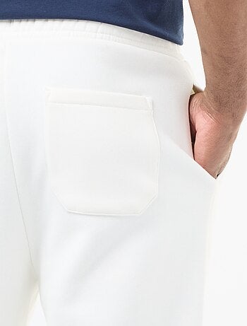 Pantalon jogging uni avec cordons de serrage à la taille