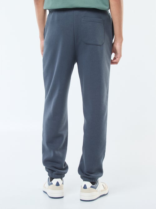 Pantalon jogging uni avec cordons de serrage à la taille - Kiabi