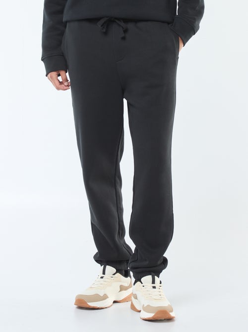Pantalon jogging uni avec cordons de serrage à la taille - Kiabi