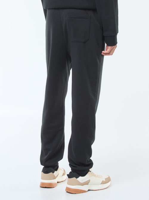 Pantalon jogging uni avec cordons de serrage à la taille - Kiabi