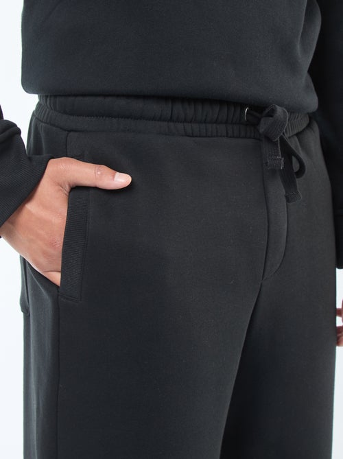 Pantalon jogging uni avec cordons de serrage à la taille - Kiabi