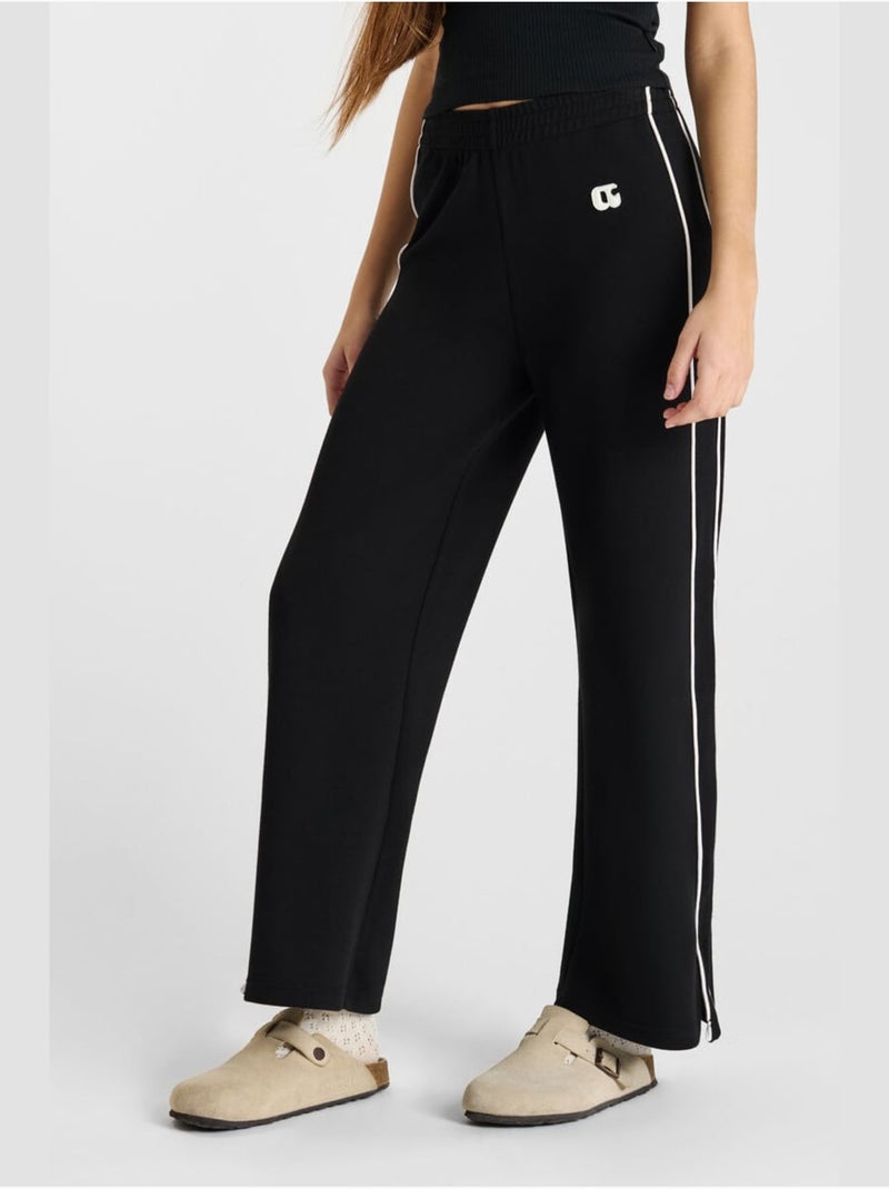 Pantalon JORUSGI jogpant 'Le Temps Des Cerises' Noir - Kiabi