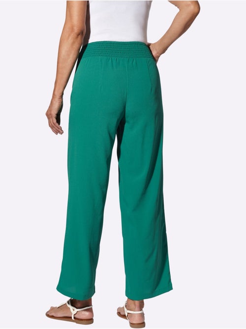 Pantalon large à ceinture smockée et longueur chevilles - Taille standard - Moda Vilona - Kiabi Pantalon large à ceinture smockée et longueur chevilles - Taille standard - Moda Vilona - Kiabi
