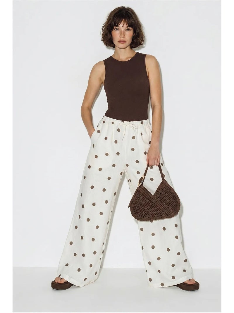 Pantalon large à pois avec ceinture à nouer lucci Ecru - Kiabi
