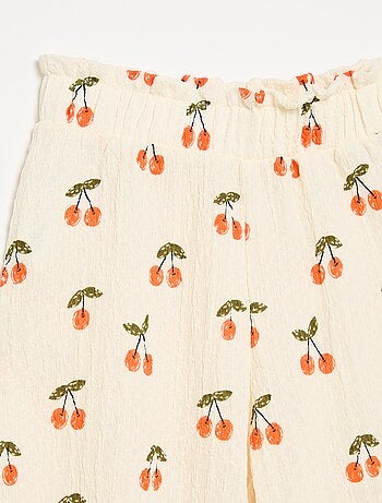 Pantalon large avec bas volantés