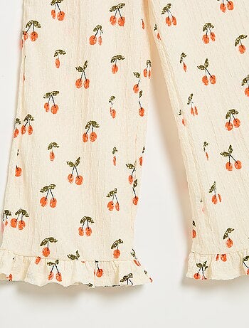 Pantalon large avec bas volantés