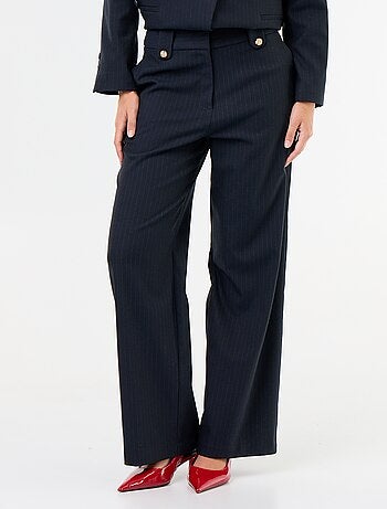 Pantalon large avec boutons dorés