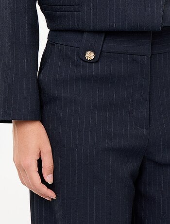 Pantalon large avec boutons dorés