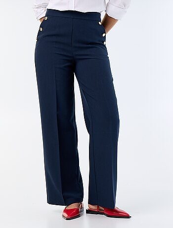 Pantalon large avec boutons dorés fantaisies sur les poches