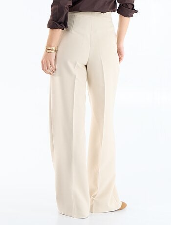 Pantalon large avec boutons dorés fantaisies sur les poches