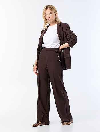 Pantalon large avec boutons dorés fantaisies sur les poches