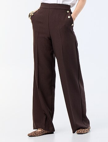 Pantalon large avec boutons dorés fantaisies sur les poches