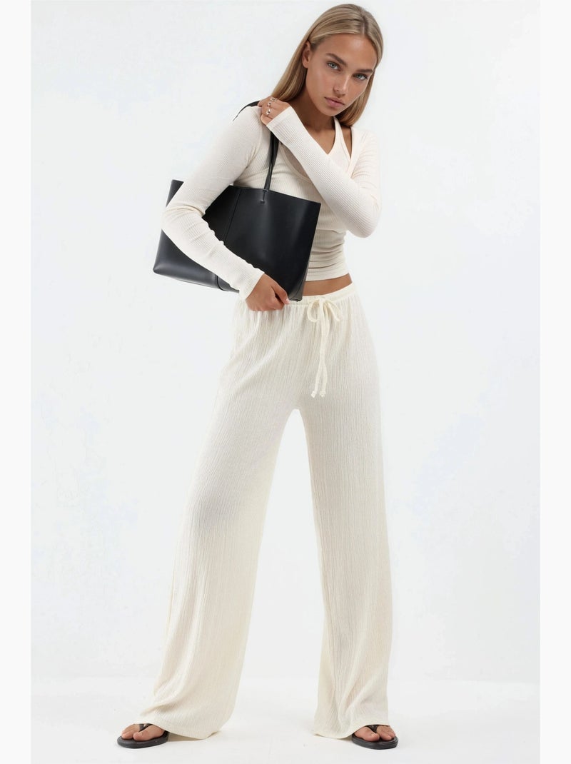 Pantalon large avec cordon de serrage à la taille busem Crème - Kiabi
