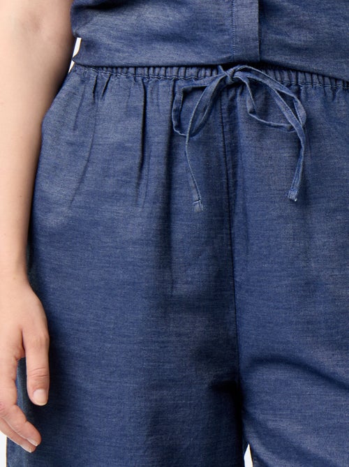 Pantalon large avec imprimés brodés - Kiabi