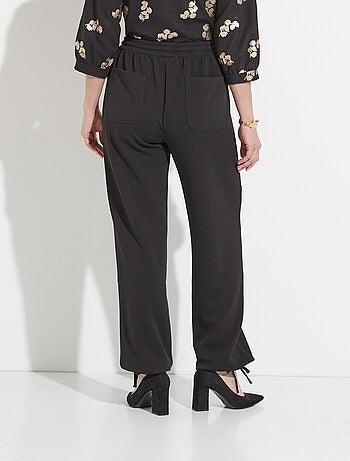 Pantalon large ceinture élastiquée maille crêpe unie