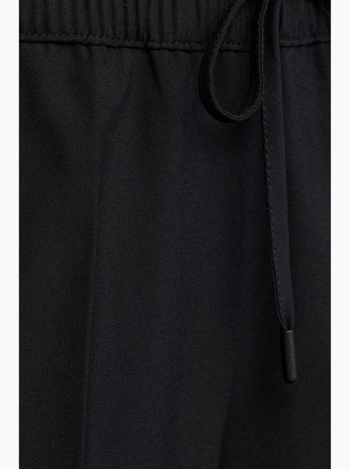 Pantalon large en crêpe à taille coulissante dilvin - Kiabi Pantalon large en crêpe à taille coulissante dilvin - Kiabi