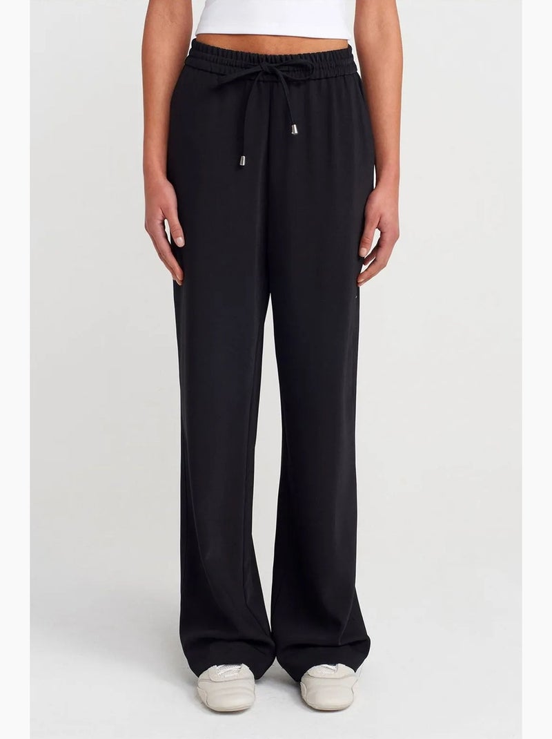 Pantalon large en crêpe dilvin Noir - Kiabi