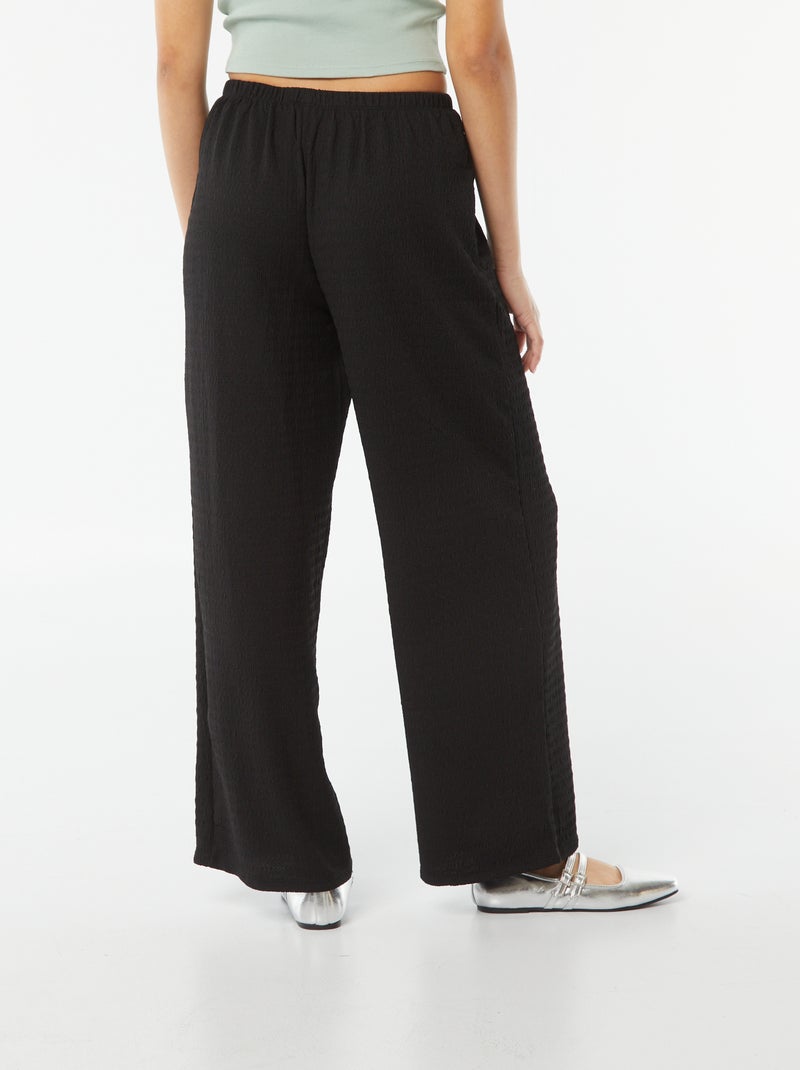 Pantalon large en maille crêpée noir - Kiabi
