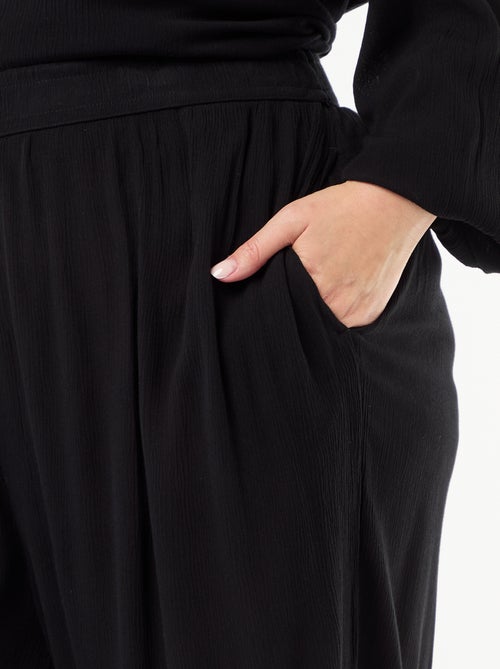 Pantalon large en maille crêpée - Kiabi