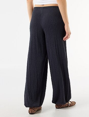 Pantalon large en maille crinkle femme