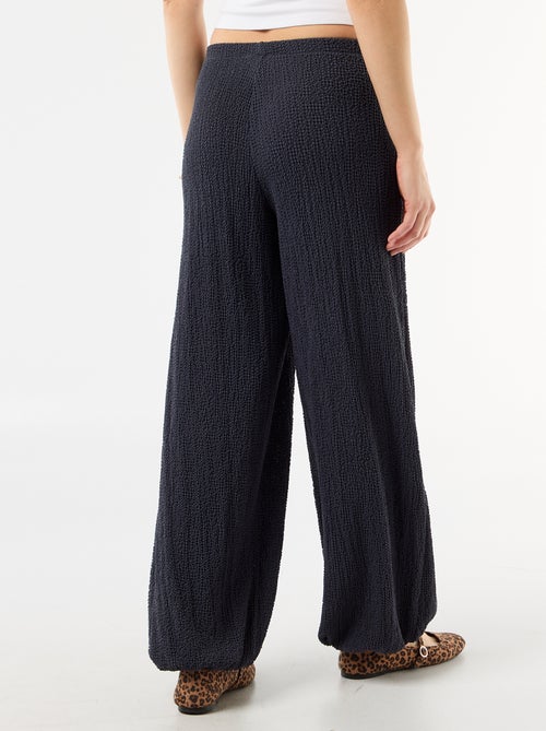 Pantalon large en maille crinkle femme - Kiabi Pantalon large en maille crinkle femme - Kiabi