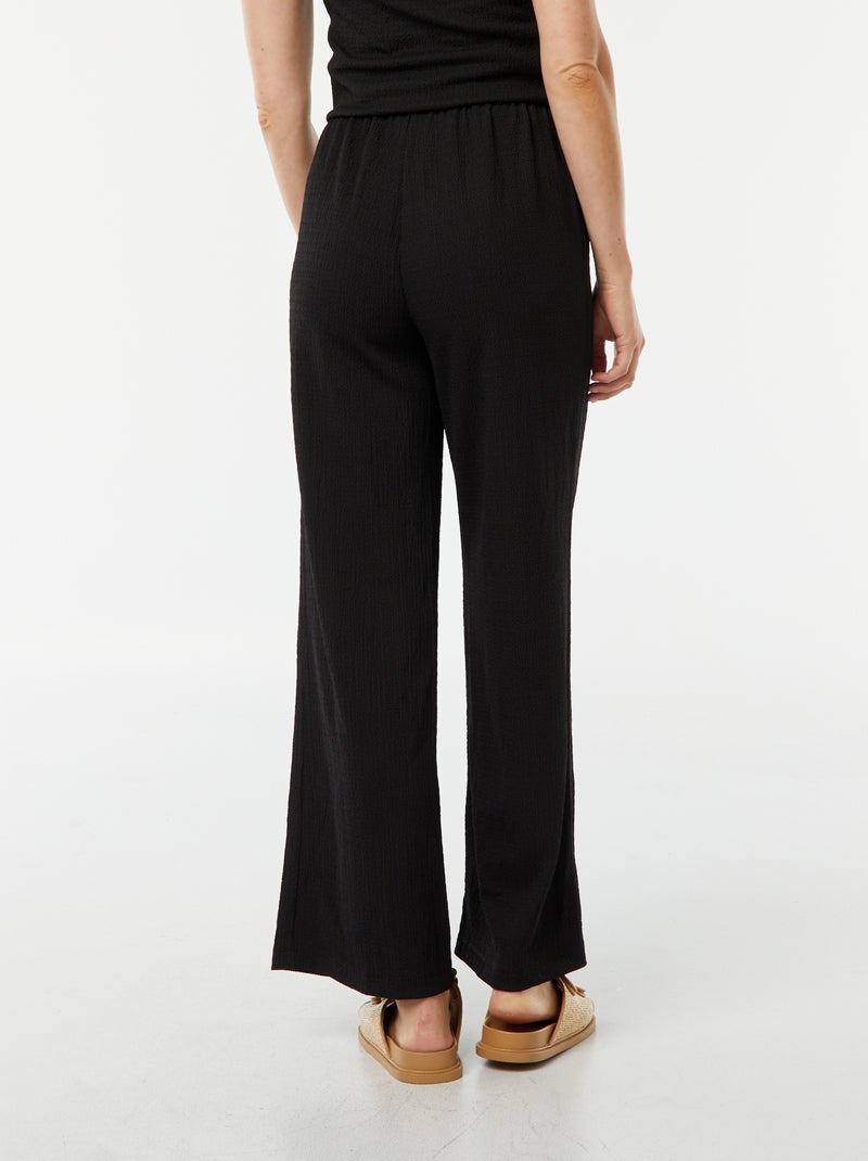 Pantalon large en maille gaufrée noir - Kiabi