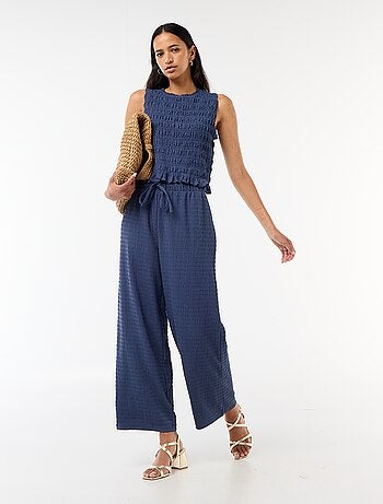 Pantalon large en maille smockée