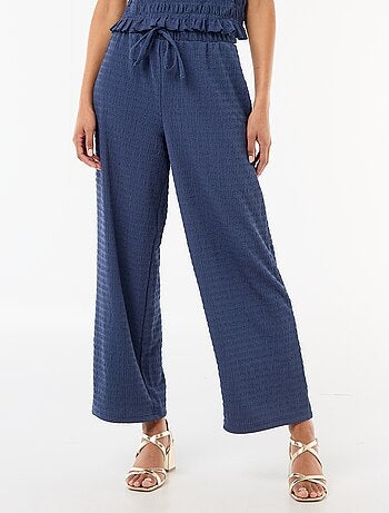 Pantalon large en maille smockée