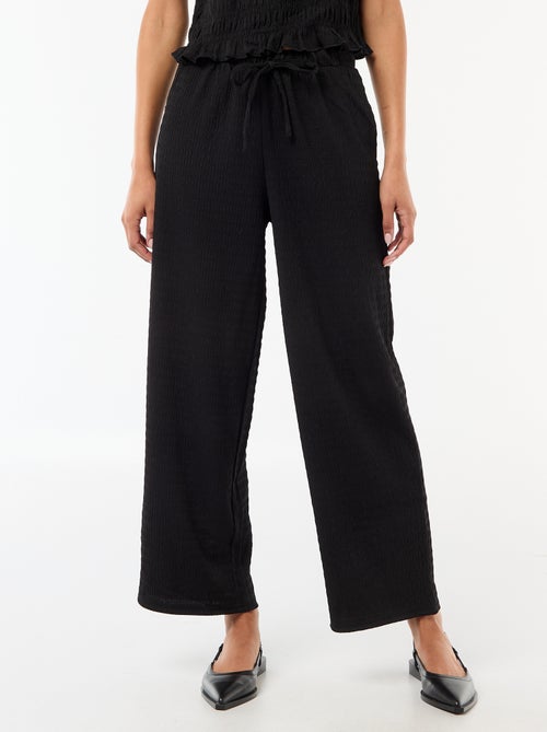 Pantalon large en maille smockée - Kiabi