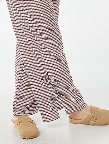 Pantalon large en matière crêpée avec nouettes