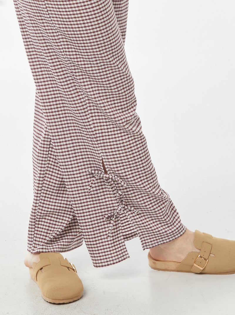 Pantalon large en matière crêpée avec nouettes Rouge - Kiabi