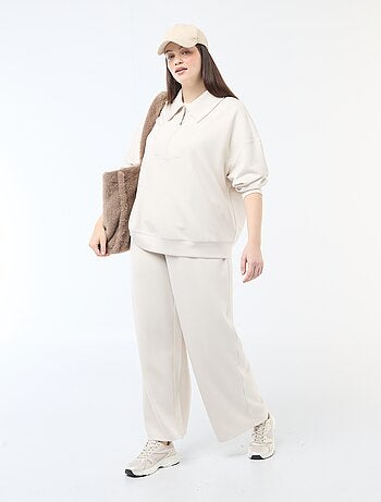 Pantalon large en matière stretch côtelée