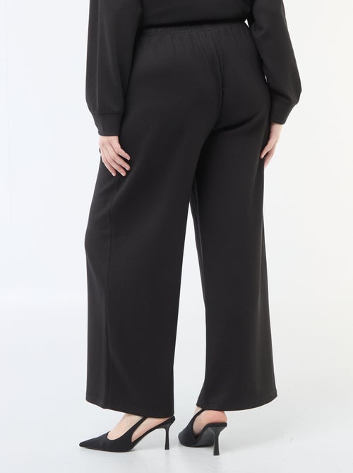 Pantalon large en matière stretch côtelée - Kiabi