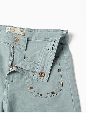 Pantalon large en sergé avec clous décoratifs