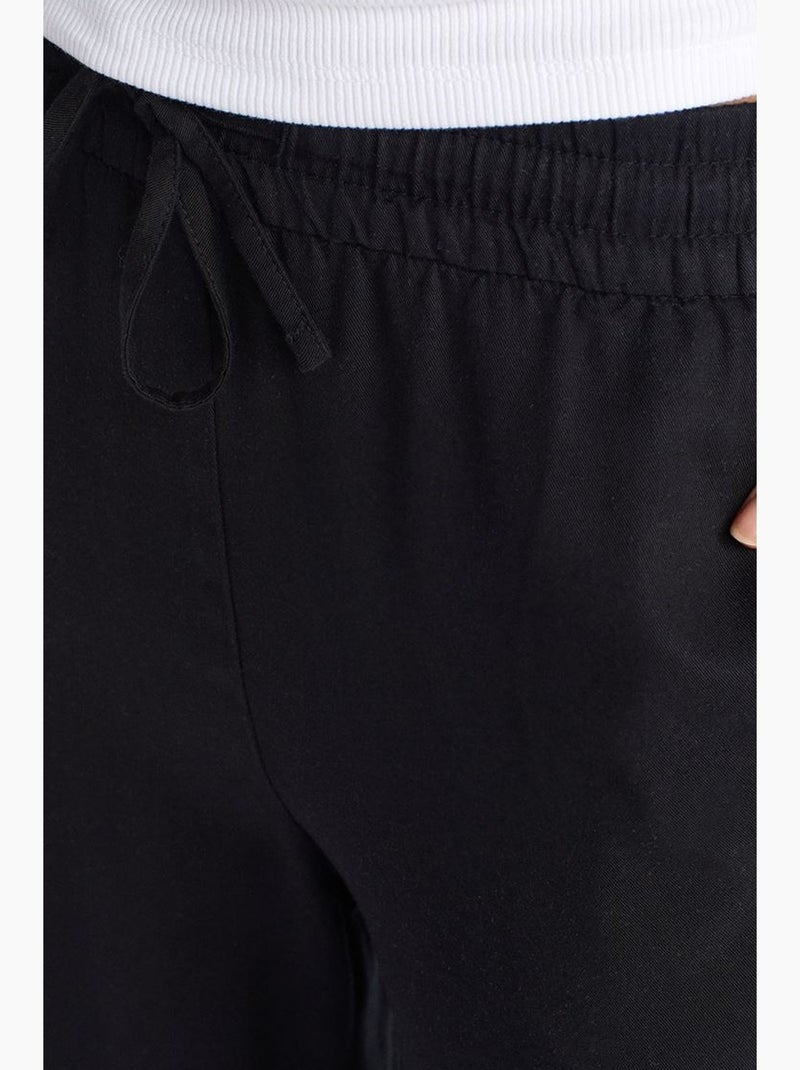 Pantalon large en tencel à taille coulissée dilvin Noir - Kiabi