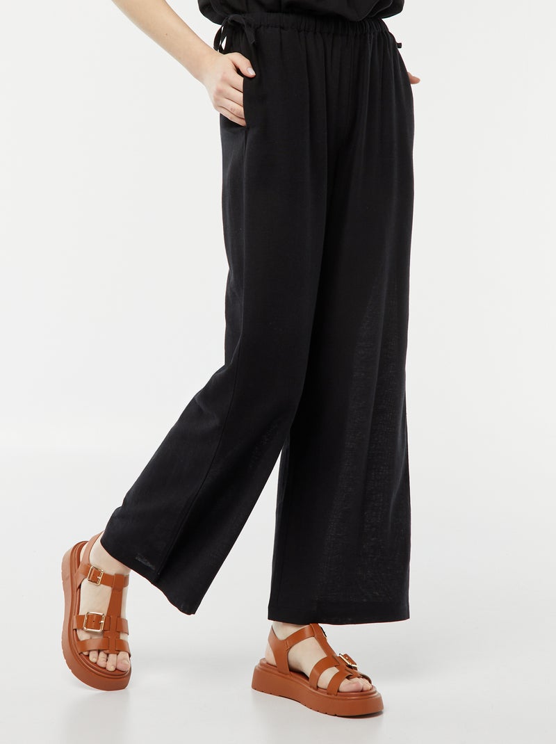 Pantalon large et fluide avec motif noir - Kiabi