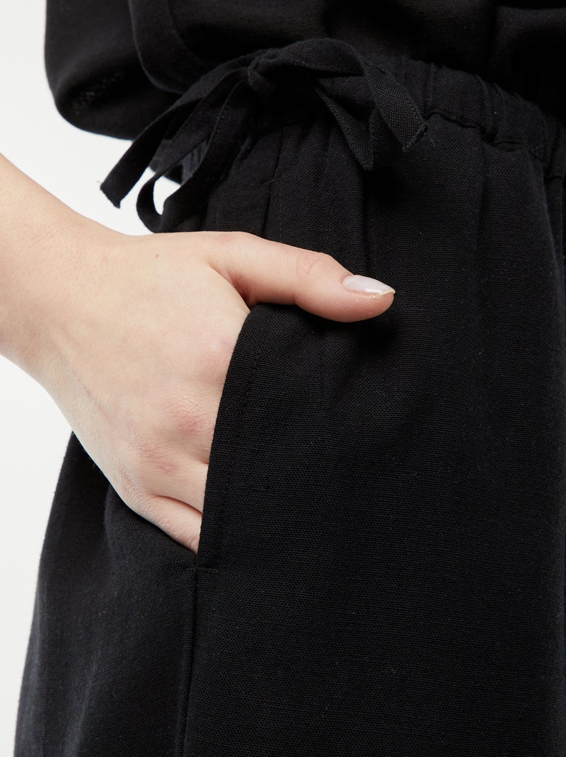 Pantalon large et fluide avec motif noir - Kiabi