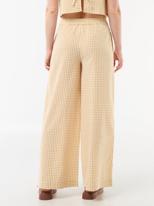 Pantalon large femme à taille élastiquée - Kiabi Pantalon large femme à taille élastiquée - Kiabi