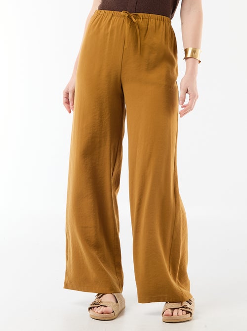 Pantalon large femme à taille élastiquée et lien à nouer - Kiabi Pantalon large femme à taille élastiquée et lien à nouer - Kiabi