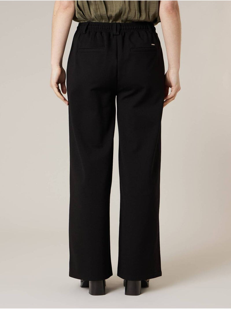 Pantalon large femme en interlock 'Deeluxe' Noir - Kiabi