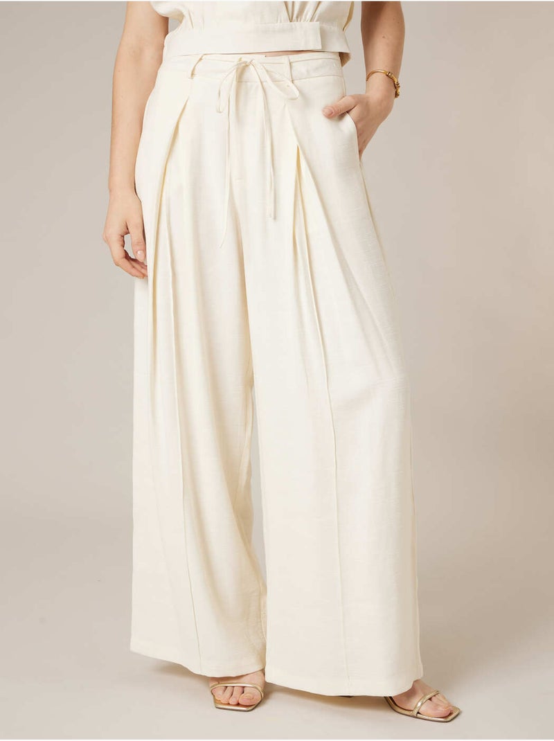 Pantalon large femme en matière fluide 'Deeluxe' Blanc - Kiabi