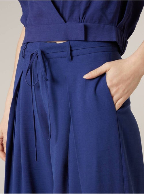 Pantalon large femme en matière fluide 'Deeluxe' - Kiabi