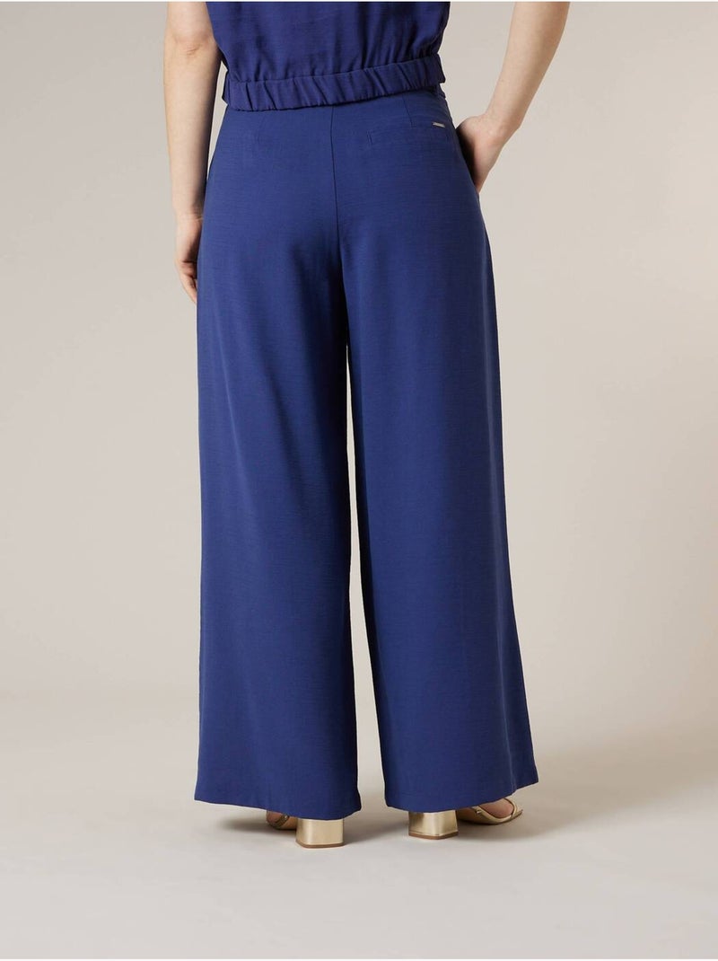 Pantalon large femme en matière fluide 'Deeluxe' Bleu marine - Kiabi