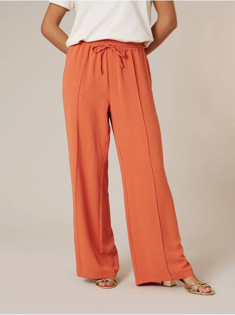 Pantalon large femme en matière fluide 'Deeluxe' Rouge brique - Kiabi