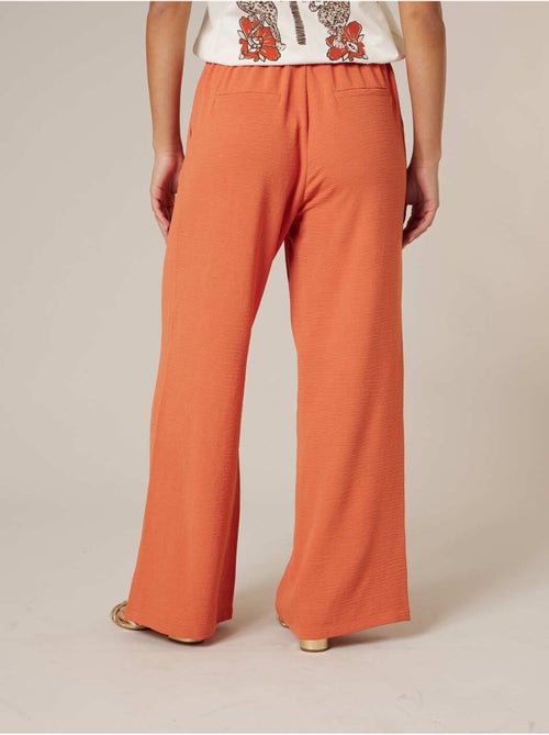 Pantalon large femme en matière fluide 'Deeluxe' - Kiabi