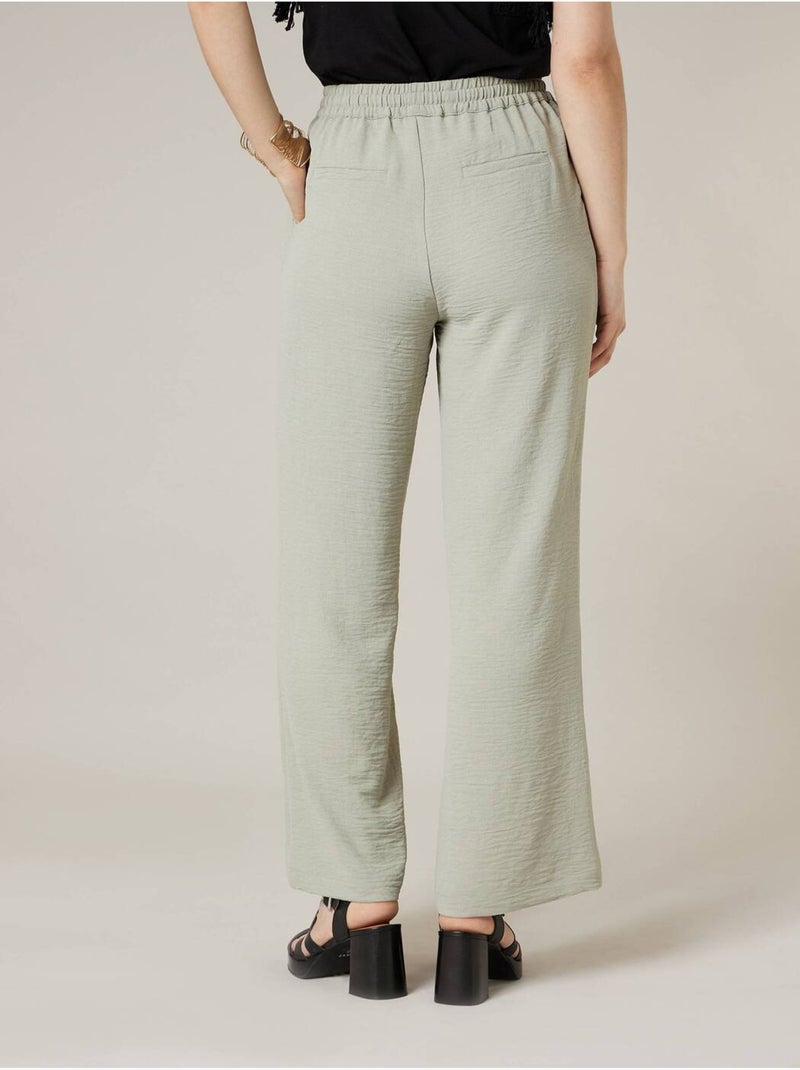 Pantalon large femme en matière fluide 'Deeluxe' Vert tilleul - Kiabi