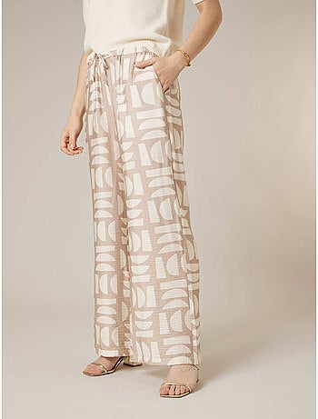 Pantalon large femme imprimé graphique 'Deeluxe'