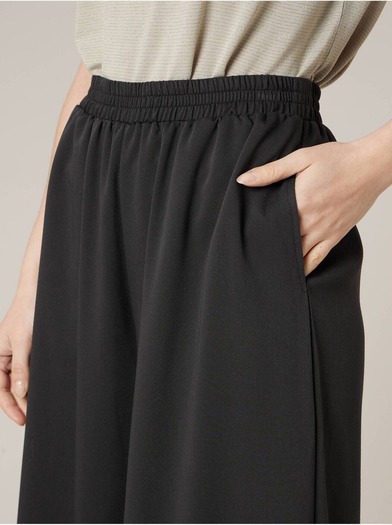 Pantalon large femme matière fluide 'Deeluxe' Noir - Kiabi